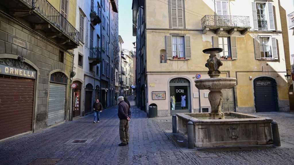 A picture taken on March 15, 2021 shows nearly deserted streets of the "Citta Alta" of Bergamo as three-quarters of Italians entered a strict lockdown as the government put in place restrictive measures to fight the rise of COVID-19 infections. (Photo by Miguel MEDINA / AFP) (Photo by MIGUEL MEDINA/AFP via Getty Images)