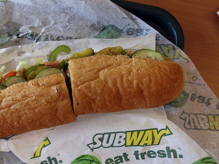 MIAMI, FL - OCTOBER 21: A Subway sandwich is seen in a restaurant as the company announced a settlement over a class-action lawsuit that alleged that Subway engaged in deceptive marketing for its 6-inch and 12-inch sandwiches and served customers less food than they were paying for on October 21, 2015 in Miami, Florida. While it denies the claims, Subway said that franchisees would be required to have a measurement tool in stores to make sure loaves are 12-inches. (Photo by Joe Raedle/Getty Images)