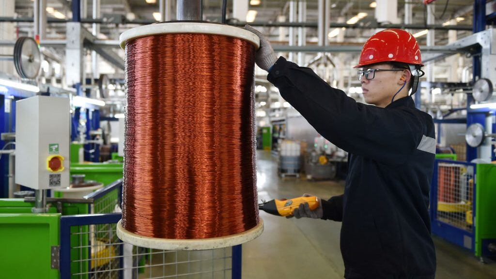 NANJING, CHINA - JANUARY 18: An employee produces copper wires at Nanjing Gree Electric Enterprise Co., Ltd. on January 18, 2021 in Nanjing, Jiangsu Province of China. (Photo by Fang Dongxu/VCG via Getty Images)