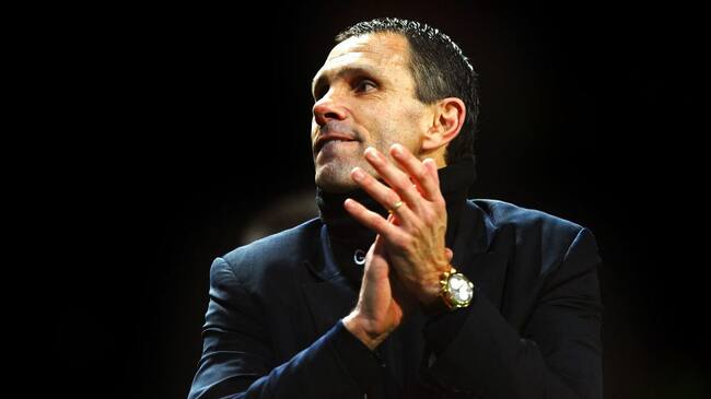 MANCHESTER, ENGLAND - JANUARY 22: Gus Poyet the Sunderland manager celebrates after his team won 2-1 in the penalty shootout during the Capital One Cup semi final, second leg match between Manchester United and Sunderland at Old Trafford on January 22, 2014 in Manchester, England. (Photo by Laurence Griffiths/Getty Images)