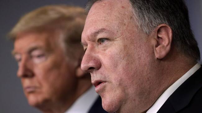 WASHINGTON, DC - MARCH 20: U.S. Secretary of State Mike Pompeo speaks as President Donald Trump listens during a news briefing on the latest development of the coronavirus outbreak in the U.S. at the James Brady Press Briefing Room at the White House March 20, 2020 in Washington, DC. With deaths caused by the coronavirus rising and foreseeable economic turmoil, the Senate is working on legislation for a $1 trillion aid package to deal with the COVID-19 pandemic. President Trump announced that tax day will be delayed from April 15 to July 15. (Photo by Alex Wong/Getty Images)