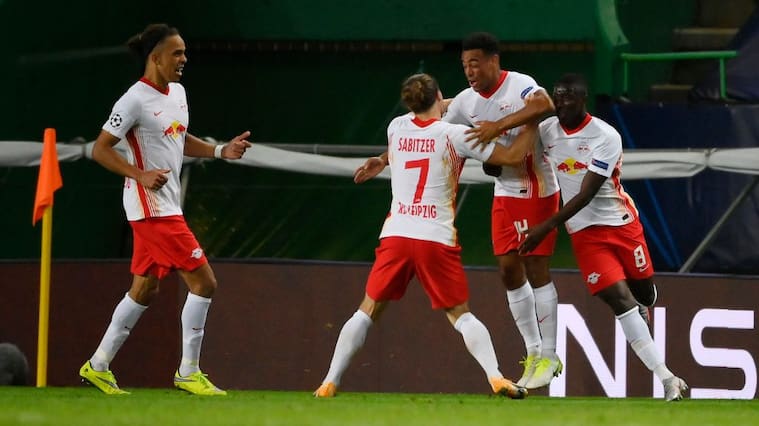 LISBON, PORTUGAL - AUGUST 13: Tyler Adams of RB Leipzig celebrates with teammates after scoring his team's second goal during the UEFA Champions League Quarter Final match between RB Leipzig and Club Atletico de Madrid at Estadio Jose Alvalade on August 13, 2020 in Lisbon, Portugal. (Photo by Lluis Gene/Getty Images)