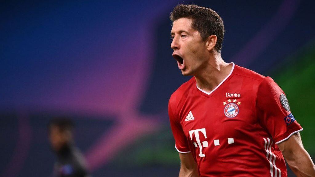 Bayern Munich's Polish forward Robert Lewandowski celebrates after scoring a goal during the UEFA Champions League semi-final football match between Lyon and Bayern Munich at the Jose Alvalade stadium in Lisbon on August 19, 2020. (Photo by FRANCK FIFE / POOL / AFP) (Photo by FRANCK FIFE/POOL/AFP via Getty Images)