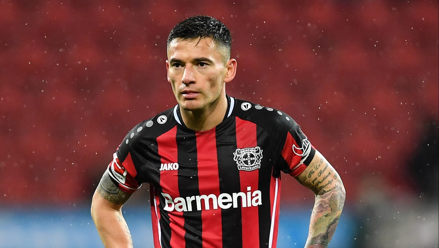 LEVERKUSEN, GERMANY - DECEMBER 04: Leverkusen`s Charles Aranguiz looks on during the Bundesliga match between Bayer 04 Leverkusen and SpVgg Greuther Fürth at BayArena on December 04, 2021 in Leverkusen, Germany. (Photo by Frederic Scheidemann/Getty Images)
