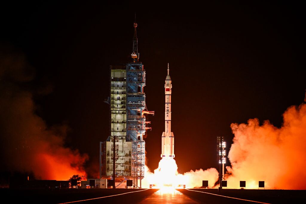 JIUQUAN, CHINA - OCTOBER 30: The Shenzhou-19 crewed spaceship, atop a Long March-2F carrier rocket, blasts off from the Jiuquan Satellite Launch Center on October 30, 2024 in Jiuquan, Gansu Province of China. China launched the Shenzhou-19 crewed spaceship on October 30, sending three astronauts -- including the country's first female space engineer -- to its orbiting space station for a six-month mission. The Shenzhou-19 crew members are Cai Xuzhe, Song Lingdong and Wang Haoze, with Cai as the mission commander, according to the China Manned Space Agency (CMSA). (Photo by Wang Xiaobo/VCG via Getty Images)