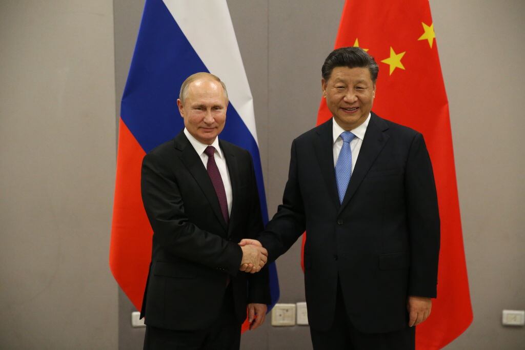 Vladimir Putin y Xi Jinping durante una reunión bilateral en 2013
