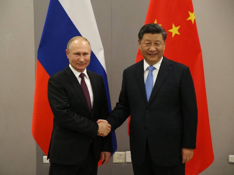 Vladimir Putin y Xi Jinping durante una reunión bilateral en 2013