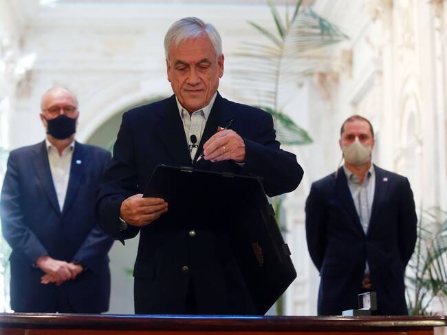 Presidente Piñera promulga reforma constitucional que amplía la elección de abril / Agencia Uno