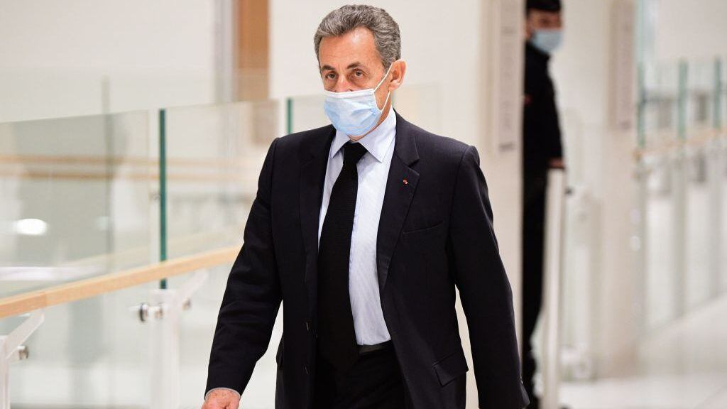 Former French President Nicolas Sarkozy arrives for a hearing at his trial on corruption charges at Paris courthouse, on December 8, 2020. - Prosecutors say Sarkozy promised the judge a plush job in Monaco in exchange for inside information on a separate inquiry into claims he had accepted illicit payments from L'Oreal heiress Liliane Bettencourt during his 2007 presidential campaign. Though he is not the first modern French head of state in the dock, Sarkozy is the first to face corruption charges. (Photo by Martin BUREAU / AFP) (Photo by MARTIN BUREAU/AFP via Getty Images)