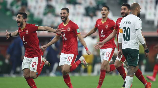 11 February 2021, Qatar, Ar-Rayyan: Al Ahly players celebrate after winning the penalty shoot-out of the FIFA Club World Cup Third Place soccer match between Al Ahly SC and Sociedade Esportiva Palmeiras at the Education City Stadium. Photo: Mahmoud Hefnawy/dpa (Photo by Mahmoud Hefnawy/picture alliance via Getty Images)