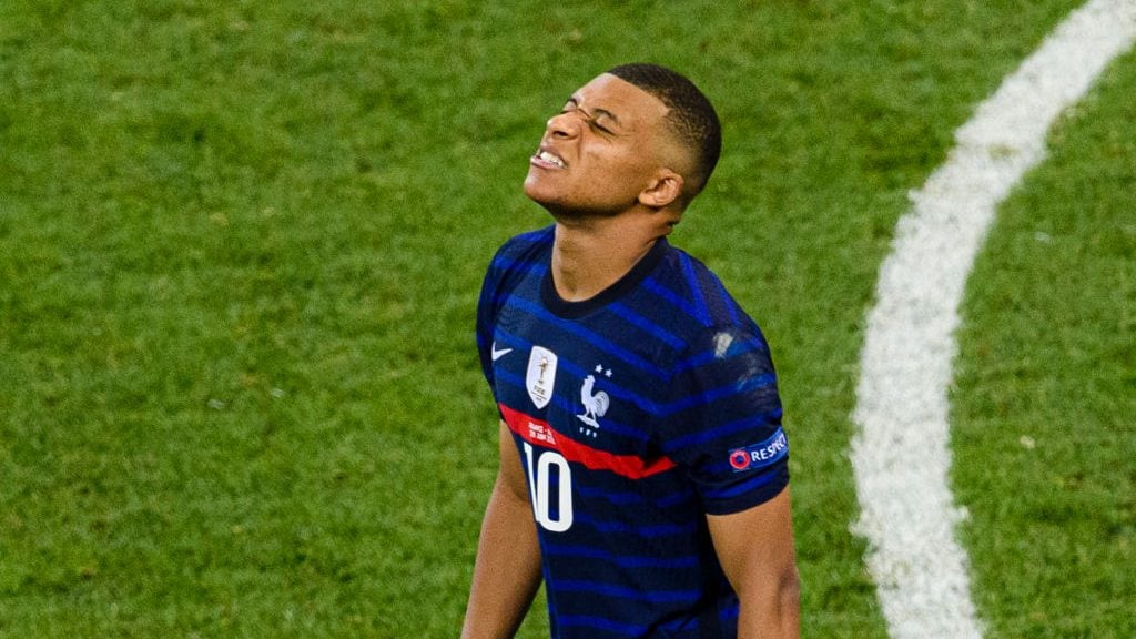 BUCHAREST, ROMANIA - JUNE 28: Kylian Mbappe of France reacts after missing a penalty shot during the UEFA Euro 2020 Championship Round of 16 match between France and Switzerland at National Arena on June 28, 2021 in Bucharest, Romania. (Photo by Marcio Machado/Getty Images)