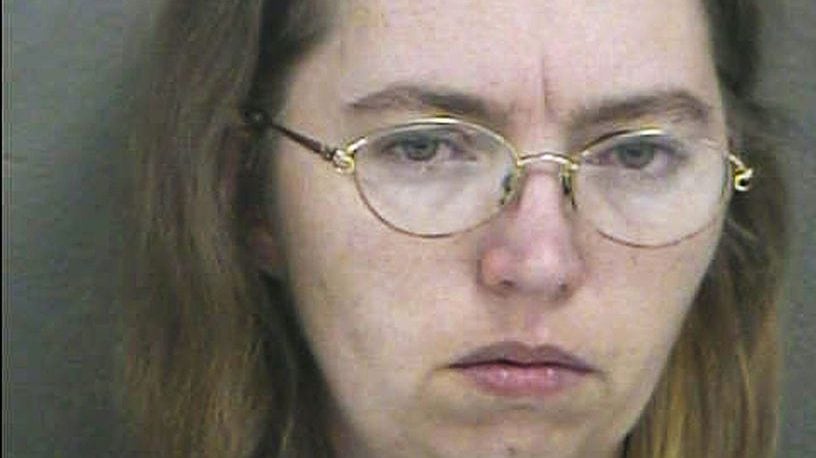 KANSAS CITY, KS - In this handout photo provided by the Wyandotte County Sheriff's Department, Lisa Montgomery appears in a booking photo released December 20, 2004 in Kansas City, Kansas. Montgomery, of Melvern, Kansas, is accused of murdering the pregnant Bobbie Jo Stinnett, cutting the fetus from her body, and claiming the live baby as her own. (Photo by Wyandotte County Sheriff's Department via Getty Images)