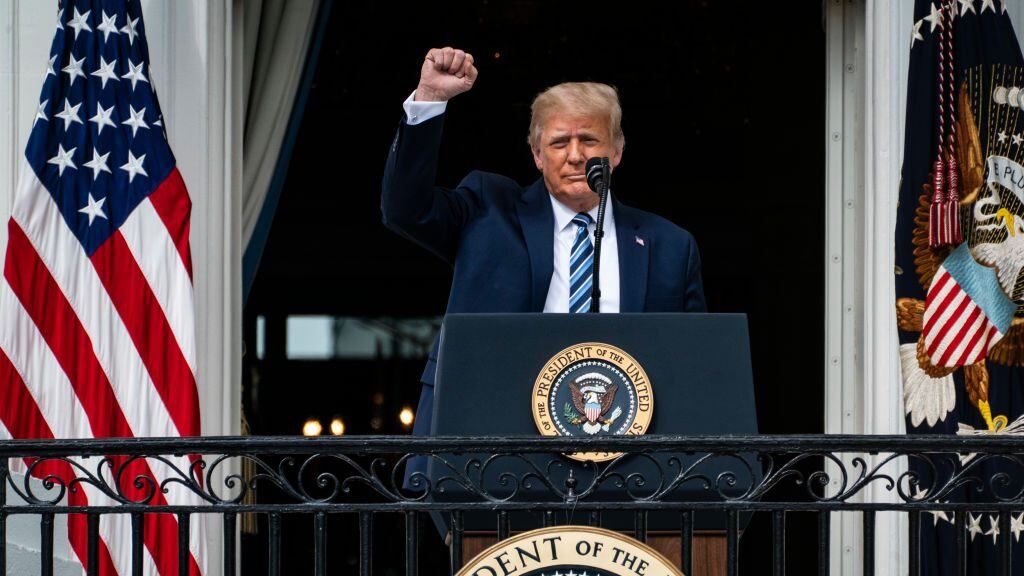 WASHINGTON, DC - OCTOBER 10: President Donald J. Trump speaks to supporters from the Blue Room balcony during an event at the White House on Saturday, Oct 10, 2020 in Washington, DC. President Donald J. Trump remains at the White House after testing positive for covid-19. (Photo by Jabin Botsford/The Washington Post via Getty Images)