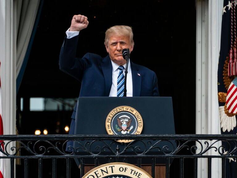 WASHINGTON, DC - OCTOBER 10: President Donald J. Trump speaks to supporters from the Blue Room balcony during an event at the White House on Saturday, Oct 10, 2020 in Washington, DC. President Donald J. Trump remains at the White House after testing positive for covid-19. (Photo by Jabin Botsford/The Washington Post via Getty Images)