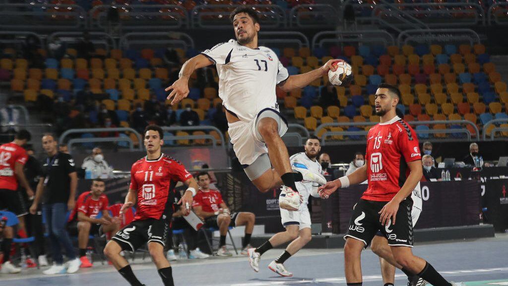 Chile's right back Rodrigo Salinas ju,ps to shoot during the opening match of the 2021 World Men's Handball Championship between Group G teams Egypt and Chile at the Cairo Stadium Sports Hall in the Egyptian capital on January 13, 2021. (Photo by MOHAMED ABD EL GHANY / POOL / AFP) (Photo by MOHAMED ABD EL GHANY/POOL/AFP via Getty Images)