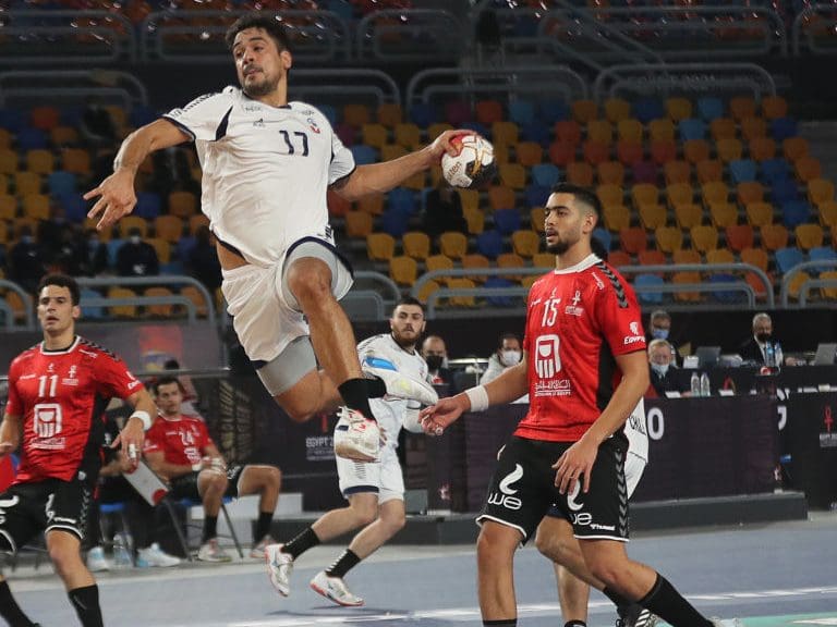 Chile&#039;s right back Rodrigo Salinas ju,ps to shoot during the opening match of the 2021 World Men&#039;s Handball Championship between Group G teams Egypt and Chile at the Cairo Stadium Sports Hall in the Egyptian capital on January 13, 2021. (Photo by MOHAMED ABD EL GHANY / POOL / AFP) (Photo by MOHAMED ABD EL GHANY/POOL/AFP via Getty Images)