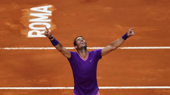 ROME, ITALY - MAY 16: Rafael Nadal of Spain celebrate winning match point over Novak Djokovic of Serbia during the men's final at Foro Italico on May 16, 2021 in Rome, Italy. (Photo by Clive Brunskill/Getty Images)