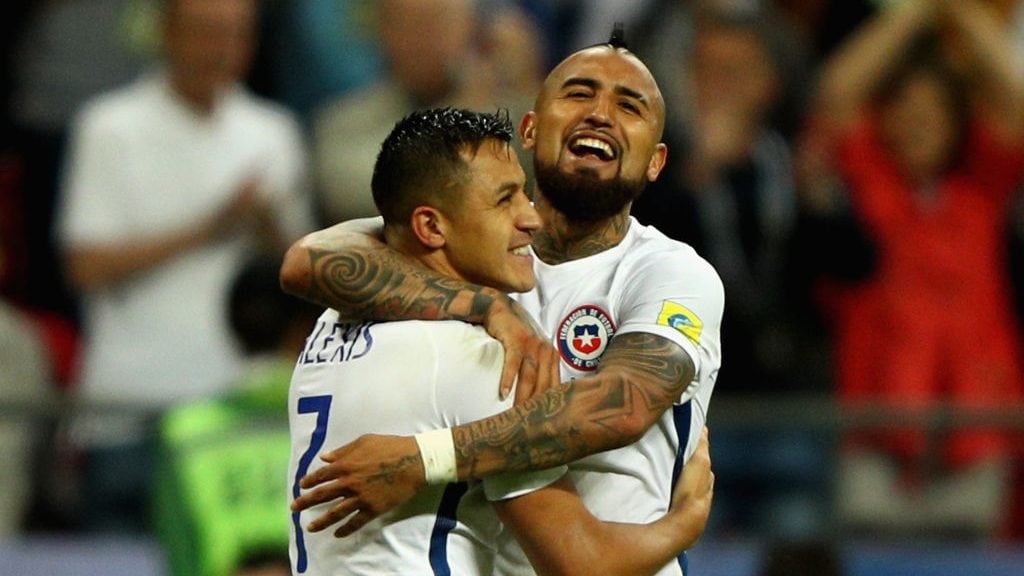 KAZAN, RUSSIA - JUNE 28:  Alexis Sanchez of Chile celebrates scoring his sides third penalty with Arturo Vidal of Chile during the FIFA Confederations Cup Russia 2017 Semi-Final between Portugal and Chile at Kazan Arena on June 28, 2017 in Kazan, Russia.  (Photo by Ian Walton/Getty Images)