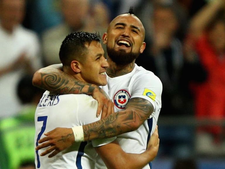KAZAN, RUSSIA - JUNE 28:  Alexis Sanchez of Chile celebrates scoring his sides third penalty with Arturo Vidal of Chile during the FIFA Confederations Cup Russia 2017 Semi-Final between Portugal and Chile at Kazan Arena on June 28, 2017 in Kazan, Russia.  (Photo by Ian Walton/Getty Images)