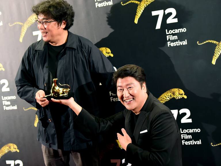 LOCARNO, SWITZERLAND - AUGUST 12:  (L - R) Director Bong Joon-ho and Actor Song Kang-ho pose at the Excellence Award  during the 72nd Locarno Film Festival on August 12, 2019 in Locarno, Switzerland.  (Photo by Pier Marco Tacca/Getty Images)