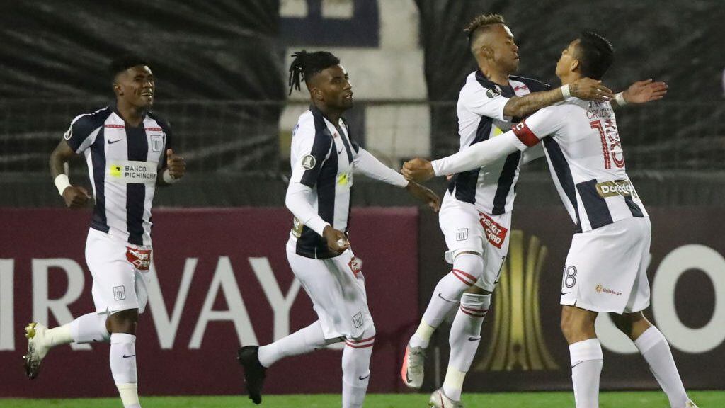 LIMA, PERU - SEPTEMBER 30: Joazinho Arroé of Alianza Lima celebrates with teammates after scoring the opening goal during a Copa CONMEBOL Libertadores 2020 group F match between Alianza Lima and Estudiantes de Mérida at Estadio Alejandro Villanueva on September 30, 2020 in Lima, Peru. (Photo by Raul Sifuentes/Getty Images)